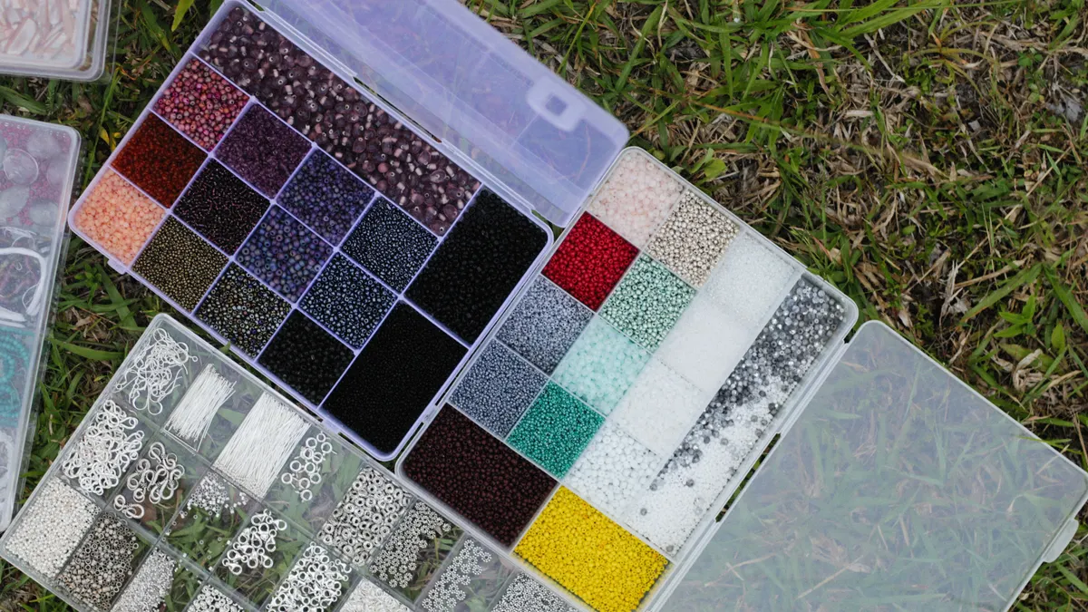Plastic storage boxes full of beads