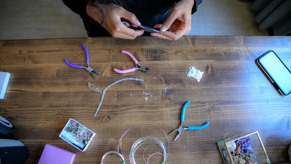 Overhead beadmaking workspace with pliers and wire