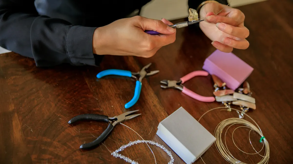 How to Make a Beaded Necklace Hands using pliers with jewelry tools and beads